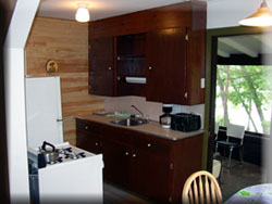 Kitchen looking onto screened porch